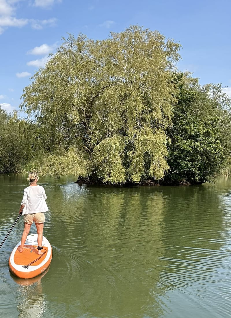 Guest relaxing at The Shift Retreats lakeside venue